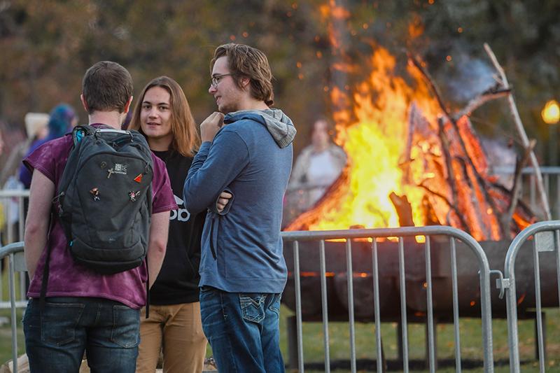 Students attend the Homecoming bonfire